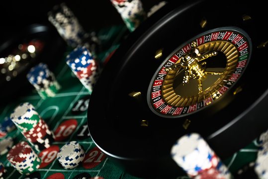People and entertainment concept. Casino, gambling, poker,  roulete