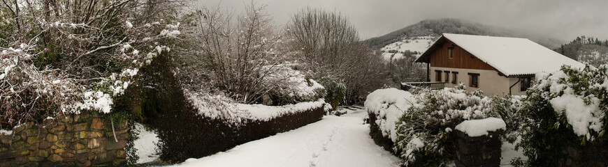 Snowy landscape of Basque farmhouse
