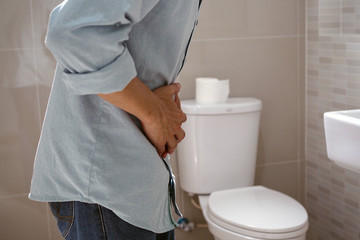 Men have abdominal pain. Want to shit. diarrhea concept