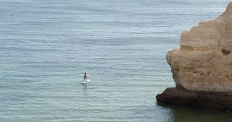 Seascape view on Praia da Cova Redonda on the south coast of Algarve tourist destination region, Portugal.
