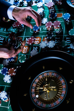 People and entertainment concept. Casino, gambling, poker,  roulete