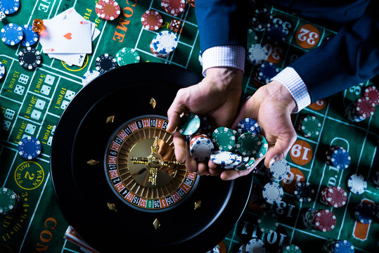 People and entertainment concept. Casino, gambling, poker,  roulete