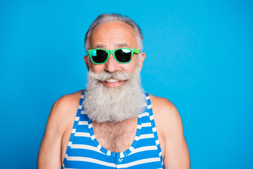 Close-up portrait of his he nice attractive funky cheerful cheery glad gray-haired man spending leisure pool party isolated over bright vivid shine turquoise blue background