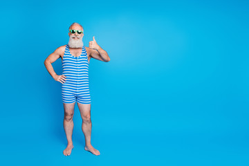 Full length body size view of his he nice attractive content cheerful cheery glad gray-haired man...