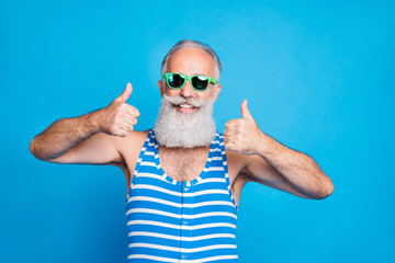Close-up portrait of his he nice attractive content cheerful cheery glad gray-haired man showing...
