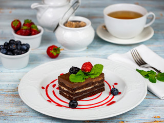 A slice of chocolate cake. Restaurant serving.