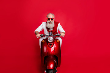 Portrait of funky elderly person in eyewear eyeglasses driving bike screaming wearing white...