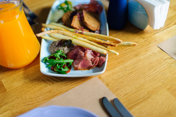 Beautiful served food on plates in restaurant