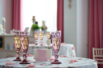 Champagne glasses on a table at a marriage party in Russia