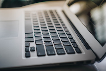 Focus on laptop computer keyboard,Tecnnology business concept.