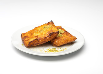 Arabian desserts of Kullaj served during Ramadan on iftar isolated on white background