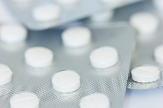 Macro photo of white prescription tablets