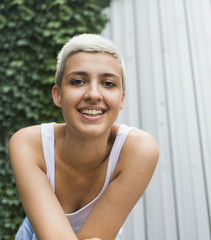 Fototapeta premium Smiling woman with short hair