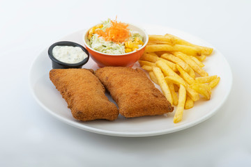 Tasty cordons bleus plate served with fries, dip and Coleslaw isolated on white background