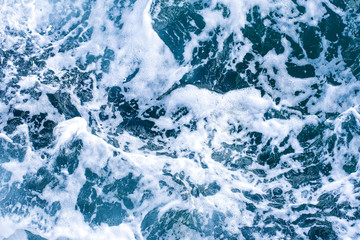 Abstract blue background with sea wave foam.