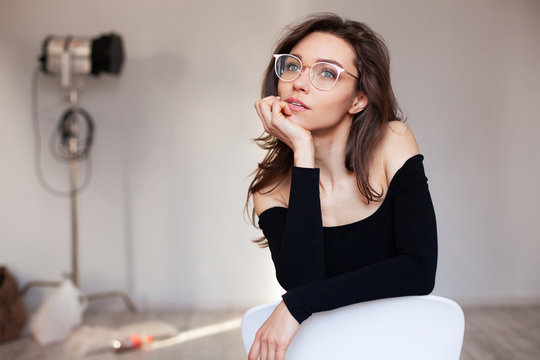 closeup portrait of woman in glasses