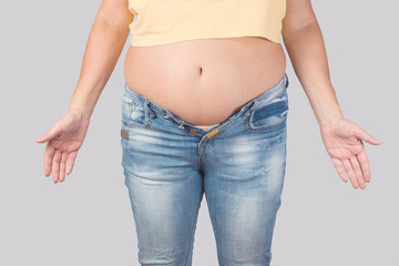 middle-aged woman suffering from obesity , the concept of overweight in the age