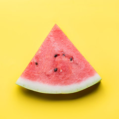 Watermelon sliced on yellow background. Flat lay. Food concept. Square image.