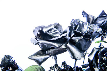luxury and success. metallized antique decoration. natural beauty. wealth and richness. silver rose flower. floristics business. Vintage. Forging and sculpture