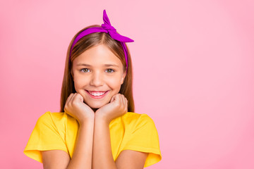Obraz na płótnie Canvas Close-up portrait of her she nice-looking shine attractive lovely winsome cheerful cheery peaceful pre-teen girl wearing yellow t-shirt holiday springtime isolated over pink pastel background