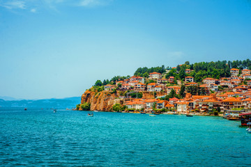 North macedonia. Ohrid. Different buildings and houses with red roofs on hill - obrazy, fototapety, plakaty