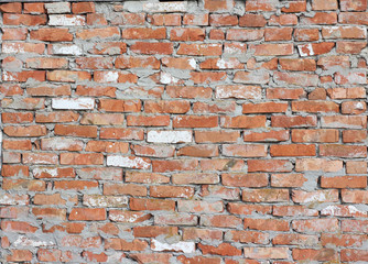Naklejka premium Red old worn brick wall texture background. Vintage effect.