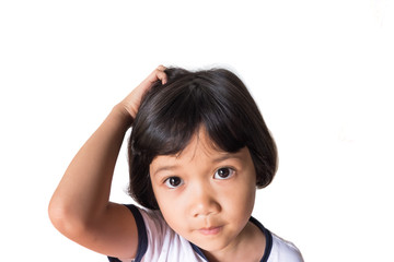 closeup asian girl head scratches caused by diseases of the scalp of children. it is lice and fungus on the scalp. cause itching and dirt. Shampoo product and medicine concept.