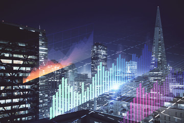 Obraz premium Financial graph on night city scape with tall buildings background multi exposure. Analysis concept.