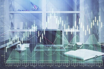 Double exposure of graph and financial info and work space with computer background. Concept of...