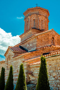North macedonia. Ohrid. Old building of Monastery of St. Naum on blue sky background. Vertical photo