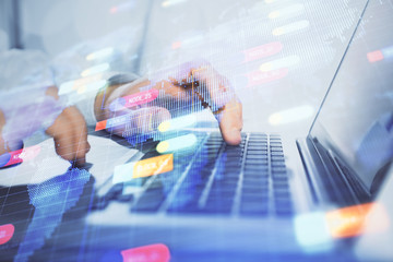 Businessman with computer background with technology theme hologram. Concept of big data. Double exposure.
