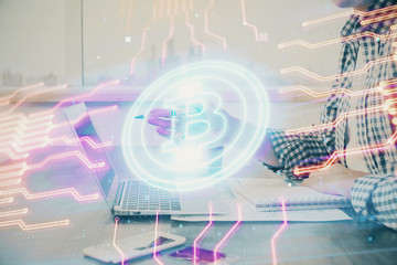 Blockchain theme hud with man working on computer on background. Concept of crypto chain. Double exposure.