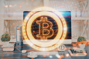 Double exposure of blockchain and crypto economy theme hologram and table with computer background....