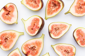 Fig fruits isolated on white background. Top view. Flat lay pattern