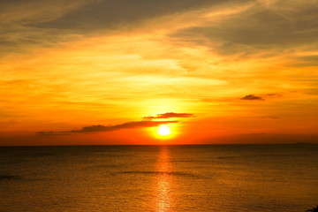 Naklejka na ściany i meble sunset above the sea with beautiful sky
