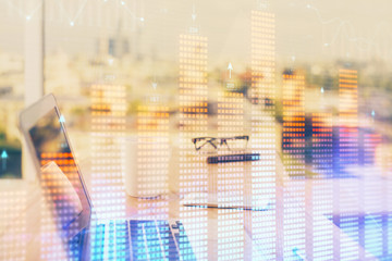 Forex Chart hologram on table with computer background. Double exposure. Concept of financial markets.