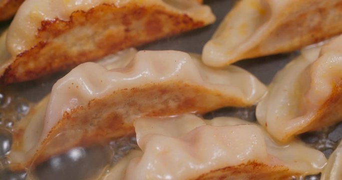 Fry with meat dumpling on pan