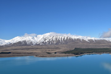 Naklejka na ściany i meble Landscape with mountain and Lake Tekapo in New Zealand