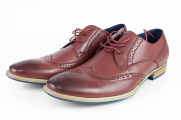 Men's stylish red shoes on white background