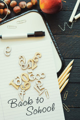 wooden numbers, autumn yellow leaves 