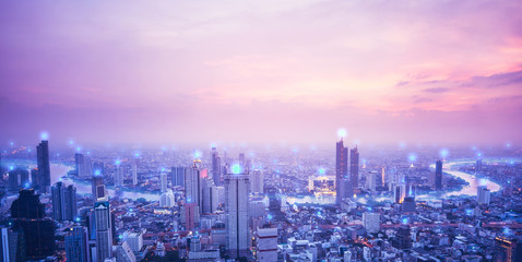 Digital network connection technology concept. Bangkok city at sunset