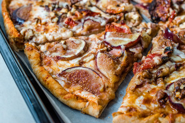 Fig Pizza with Walnut and Sun Dried Tomatoes.