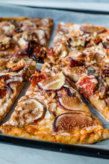 Fig Pizza with Walnut and Sun Dried Tomatoes.