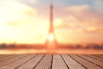 blurred landscape of the eiffel tower with wooden terrace