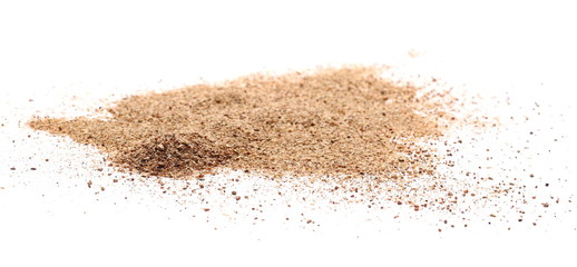 Ground carob powder (Ceratonia siliqua) isolated on white background