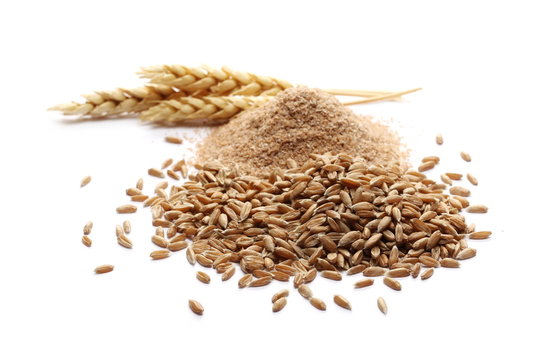 Spelt bran and grains with ears of wheat isolated on white background