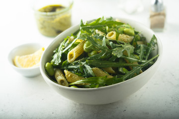 Pasta salad with pesto and arugula