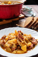 Meat stew with potato and cabbage, top view