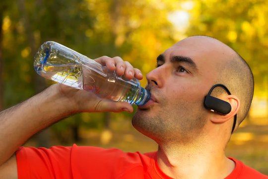 Man Refresh After Exercise, Close Up