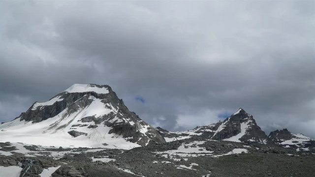 Time lapse of Clouds move overthe Italian Alps. Gran paradiso national park. 4K